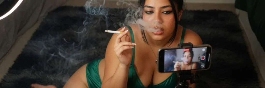 cam girl smoking on live video call